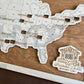 A wall-mounted map showcasing the locations of Presidential Libraries in the United States with a wooden frame and markers. The map is labeled with 'Bucket List' and 'Presidential Libraries'. Close up view