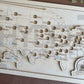 A framed State Capitals bucket list map with a natural wood finish, white tokens, and a sawtooth hanger. The map shows a list of state capitals and has a seal stamp with the text 'STATE CAPITALS' on it.