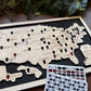 Map of the United States with labeled regions on a black background