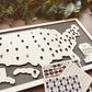 Map of the United States with decorative token pins on a wooden surface